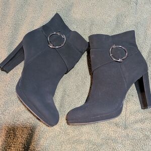 Chic Black Heeled Ankle Boots with Silver Accent